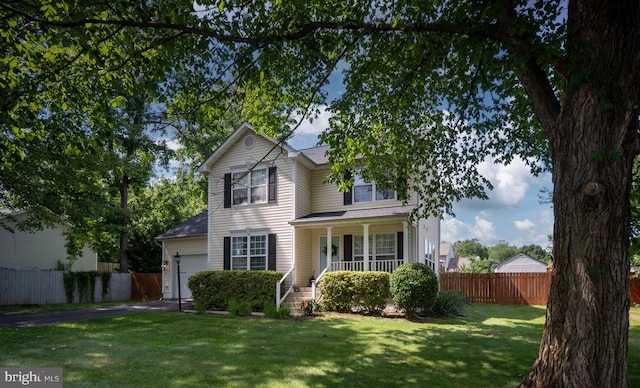 5008 Blake Dr, Fredericksburg, VA 22407 - traditional home with covered porch, a garage, and driveway