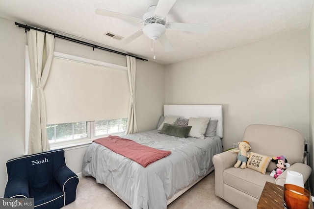 5008 Blake Dr, Fredericksburg, VA 22407 - bedroom with light colored carpet and ceiling fan