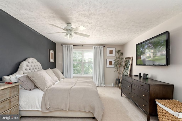 5008 Blake Dr, Fredericksburg, VA 22407 - bedroom with light colored carpet, a textured ceiling, and ceiling fan