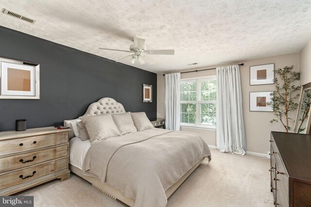 5008 Blake Dr, Fredericksburg, VA 22407 - bedroom featuring a textured ceiling, light colored carpet, and ceiling fan