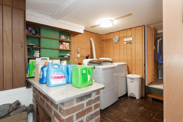 310 Spotswood Ave E, Elkton, VA 22827 - laundry room featuring washer and dryer, wooden walls, and tile patterned floors