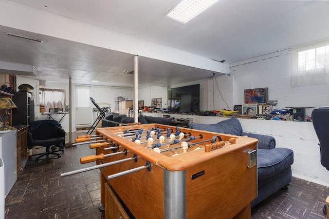 310 Spotswood Ave E, Elkton, VA 22827 - misc room featuring plenty of natural light, tile patterned floors, and concrete block wall