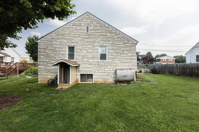310 Spotswood Ave E, Elkton, VA 22827 - back of house with stone siding and heating fuel