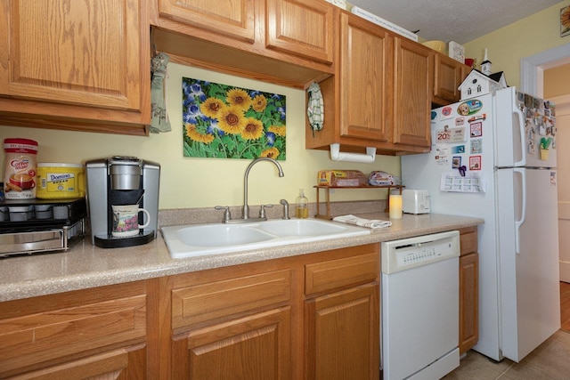 310 Spotswood Ave E, Elkton, VA 22827 - kitchen featuring white appliances, a sink, light countertops, and brown cabinetry