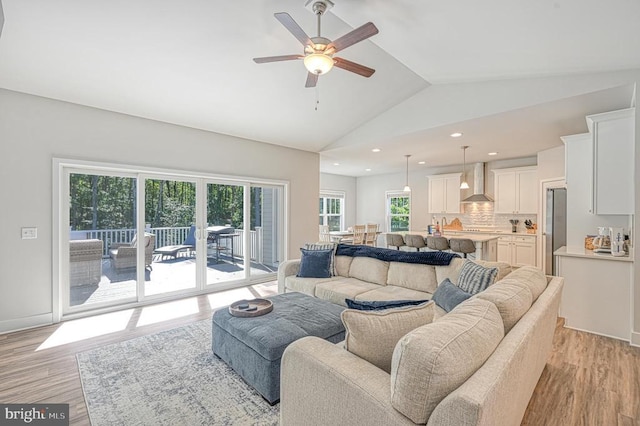5220 Wyndemere Cir, Mineral, VA 23117 - living room with light wood finished floors, lofted ceiling, a ceiling fan, and recessed lighting