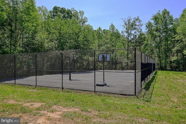 5220 Wyndemere Cir, Mineral, VA 23117 - view of tennis court featuring a wooded view and community basketball court