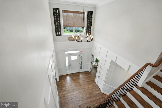 10901 Brandermill Park, Spotsylvania, VA 22551 - foyer with a decorative wall, a chandelier, stairway, dark wood finished floors, and crown molding