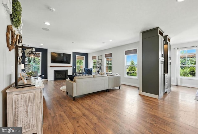 10901 Brandermill Park, Spotsylvania, VA 22551 - living room featuring a large fireplace, dark wood-style flooring, and recessed lighting