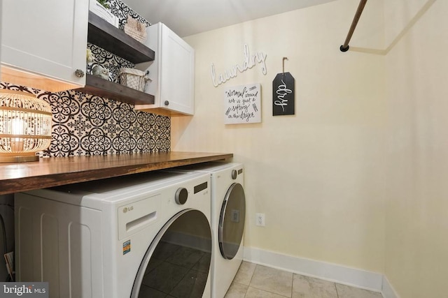 10901 Brandermill Park, Spotsylvania, VA 22551 - laundry room featuring washer and clothes dryer, cabinet space, and light tile patterned floors
