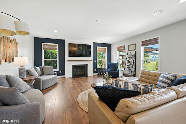 10901 Brandermill Park, Spotsylvania, VA 22551 - living area with hardwood / wood-style floors, recessed lighting, plenty of natural light, and a large fireplace