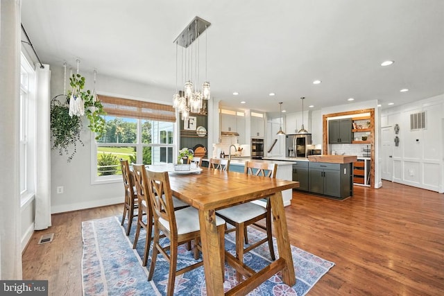 10901 Brandermill Park, Spotsylvania, VA 22551 - dining area featuring a chandelier, wood finished floors, and recessed lighting