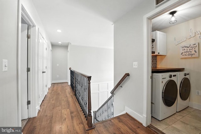 10901 Brandermill Park, Spotsylvania, VA 22551 - laundry room with washing machine and dryer, cabinet space, wood finished floors, and recessed lighting
