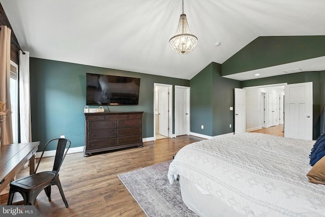 10901 Brandermill Park, Spotsylvania, VA 22551 - bedroom featuring a chandelier, lofted ceiling, and wood finished floors