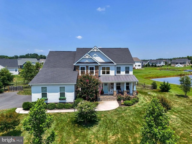 10901 Brandermill Park, Spotsylvania, VA 22551 - craftsman-style house with covered porch, a standing seam roof, a metal roof, a water view, and a residential view