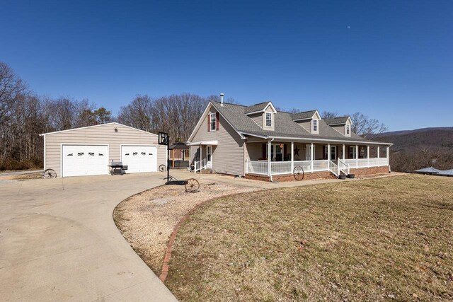 18785 Red Brush Rd, Elkton, VA 22827 - view of front facade featuring covered porch, a front lawn, an outdoor structure, roof with shingles, and a detached garage