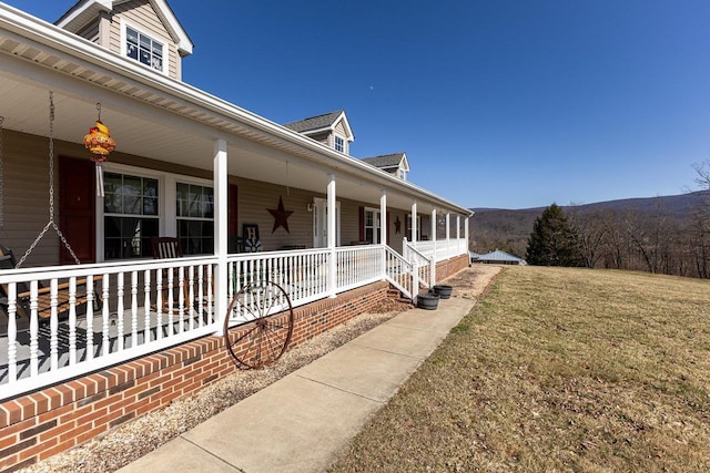 18785 Red Brush Rd, Elkton, VA 22827 - view of property exterior featuring a yard and a porch
