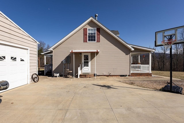 18785 Red Brush Rd, Elkton, VA 22827 - back of house with covered porch and a garage