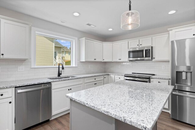 LOT155 Langley Dr, Waynesboro, VA 22980 - kitchen featuring stainless steel appliances, a sink, white cabinetry, dark wood finished floors, and tasteful backsplash