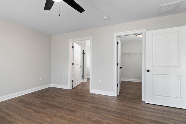 LOT155 Langley Dr, Waynesboro, VA 22980 - unfurnished bedroom featuring wood finished floors, baseboards, a walk in closet, connected bathroom, and a closet