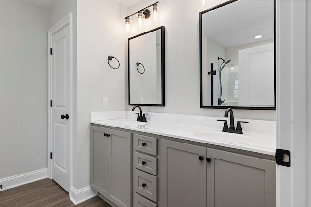 LOT155 Langley Dr, Waynesboro, VA 22980 - bathroom featuring double vanity, wood finished floors, baseboards, and a shower