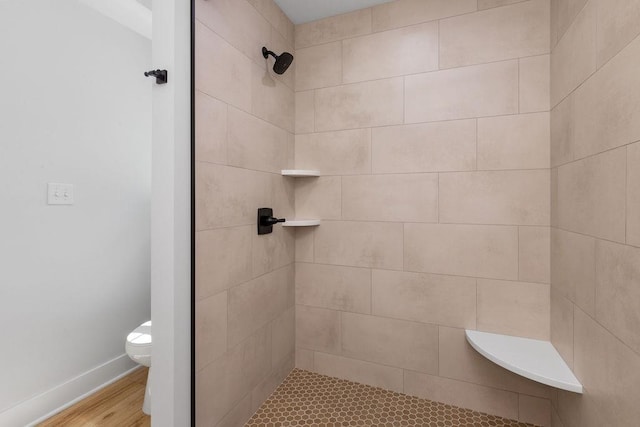LOT155 Langley Dr, Waynesboro, VA 22980 - bathroom featuring toilet, tiled shower, wood finished floors, and baseboards