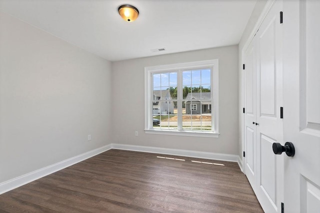 LOT155 Langley Dr, Waynesboro, VA 22980 - unfurnished bedroom featuring a closet, dark wood-type flooring, and baseboards