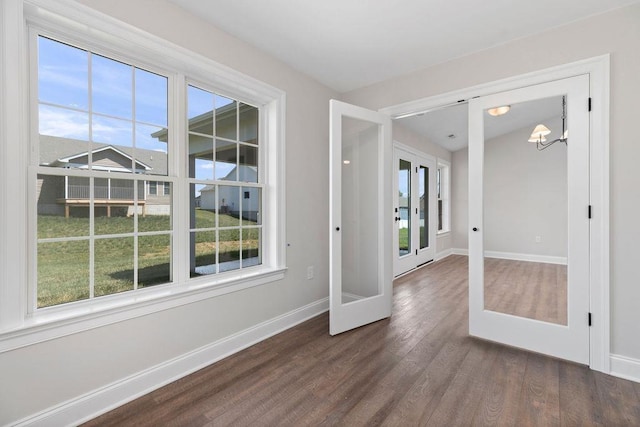LOT155 Langley Dr, Waynesboro, VA 22980 - empty room featuring french doors, baseboards, healthy amount of natural light, and dark wood finished floors