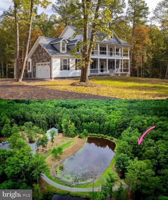 11506 Light Ln, Spotsylvania, VA 22551 - view of yard featuring covered porch, a water view, and a garage