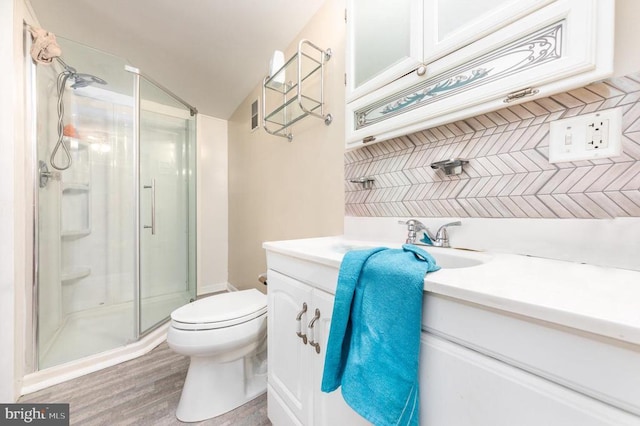 234 Landon Ln, Orange, VA 22960 - full bathroom featuring a stall shower, vanity, toilet, wood finished floors, and vaulted ceiling