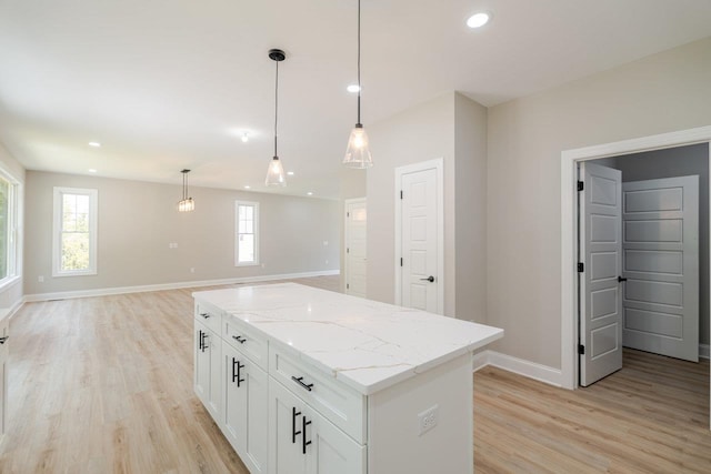 4125 Romney Ct, Rockingham, VA 22802 - kitchen featuring light wood finished floors, recessed lighting, a kitchen island, decorative light fixtures, and white cabinets