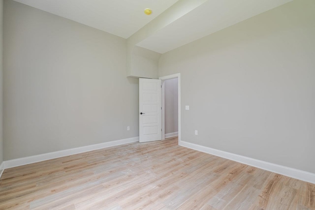 4125 Romney Ct, Rockingham, VA 22802 - empty room featuring light wood-style floors and lofted ceiling