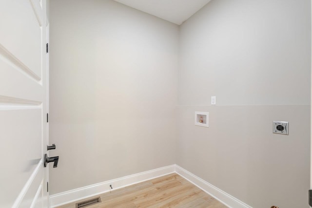 4125 Romney Ct, Rockingham, VA 22802 - laundry area with hookup for a washing machine, electric dryer hookup, and light wood-type flooring