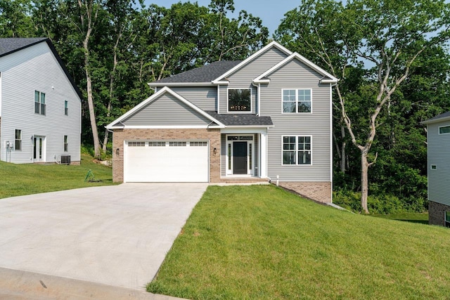 4125 Romney Ct, Rockingham, VA 22802 - traditional home with driveway, an attached garage, a front lawn, brick siding, and roof with shingles