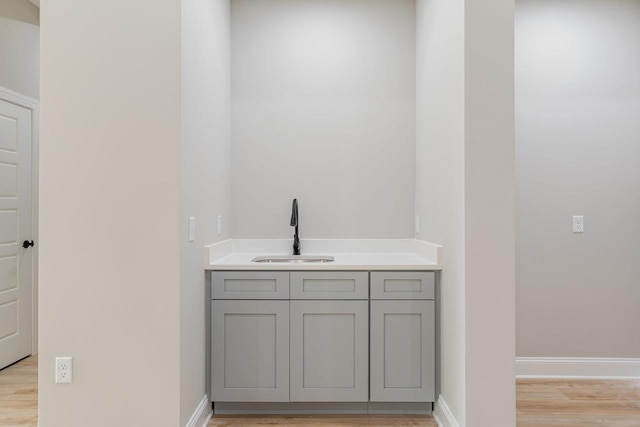 4125 Romney Ct, Rockingham, VA 22802 - bar area with a sink and light wood finished floors