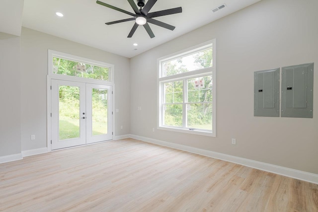 4125 Romney Ct, Rockingham, VA 22802 - unfurnished room with electric panel, light wood-style flooring, a ceiling fan, recessed lighting, and french doors