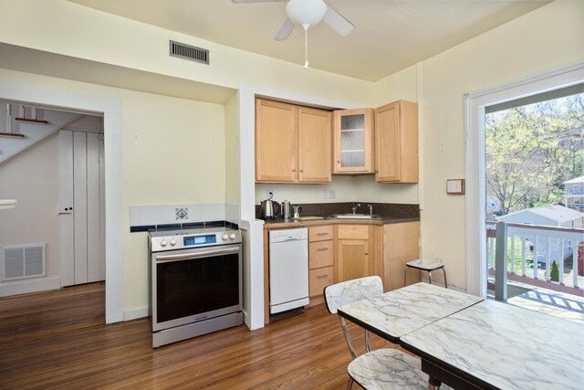 940 Beverley St W, Staunton, VA 24401 - kitchen featuring wall oven, light brown cabinetry, white dishwasher, and dark wood finished floors