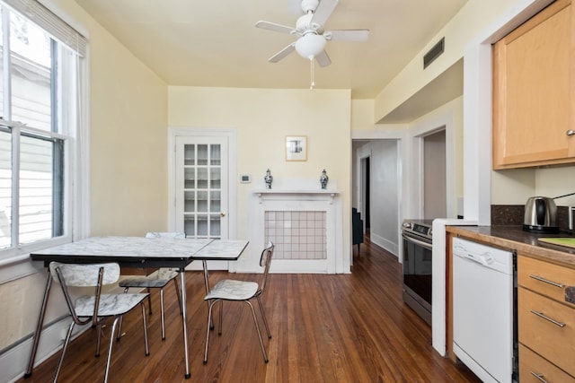 940 Beverley St W, Staunton, VA 24401 - kitchen featuring white dishwasher, stainless steel electric stove, dark wood-style floors, light brown cabinetry, and dark countertops