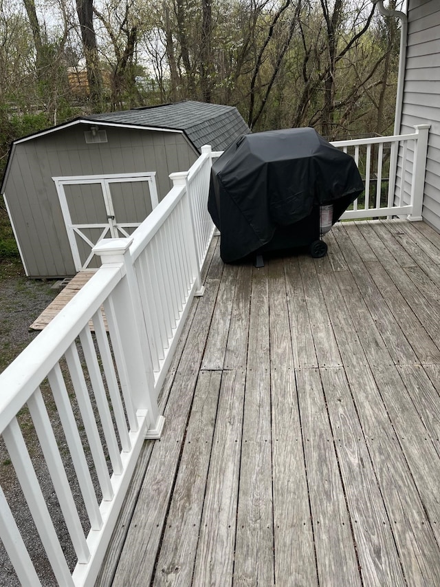 290 Shenandoah River Rd, Shenandoah, VA 22849 - wooden terrace with an outdoor structure, a grill, and a shed