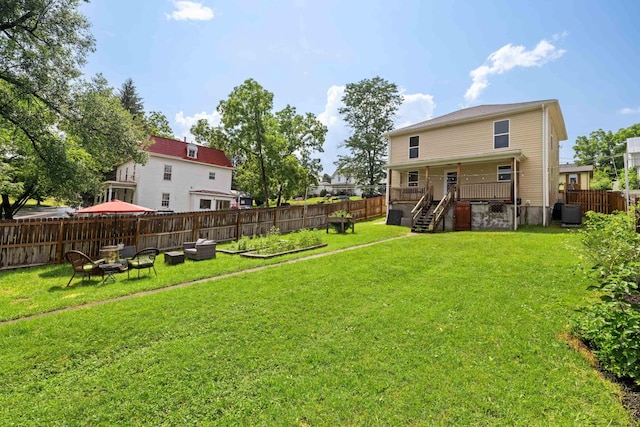 832 Grayson Ave, Waynesboro, VA 22980 - fenced backyard featuring a fire pit and stairway