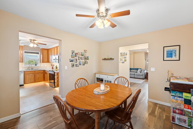 832 Grayson Ave, Waynesboro, VA 22980 - dining room featuring ceiling fan and light wood-style floors