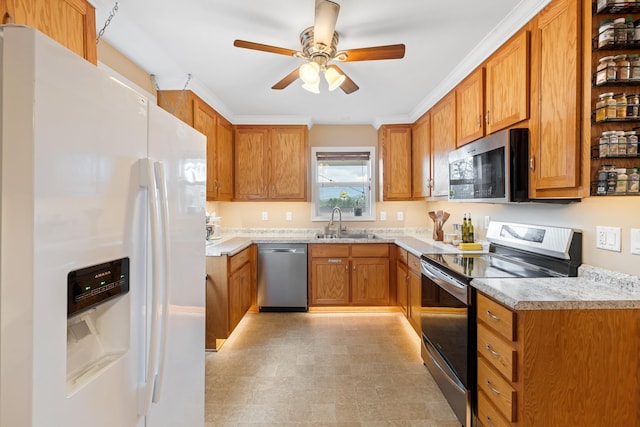 832 Grayson Ave, Waynesboro, VA 22980 - kitchen with stainless steel appliances, brown cabinetry, ceiling fan, and light countertops