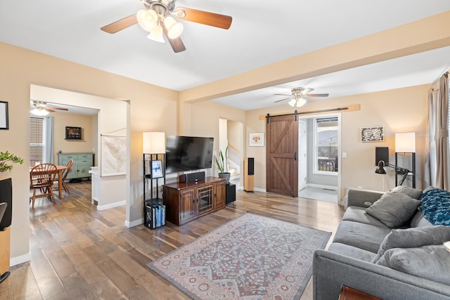 832 Grayson Ave, Waynesboro, VA 22980 - living area featuring a barn door, ceiling fan, and wood finished floors