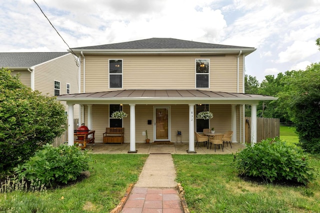 832 Grayson Ave, Waynesboro, VA 22980 - view of front of home with a standing seam roof, a metal roof, and a porch