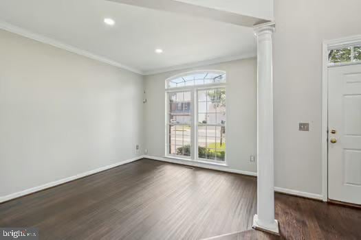 1025 Riverdale Cir, Culpeper, VA 22701 - entryway featuring decorative columns, wood finished floors, plenty of natural light, crown molding, and recessed lighting