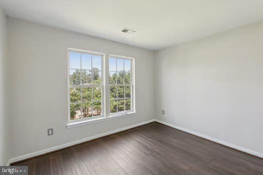 1025 Riverdale Cir, Culpeper, VA 22701 - empty room with dark wood-type flooring and baseboards