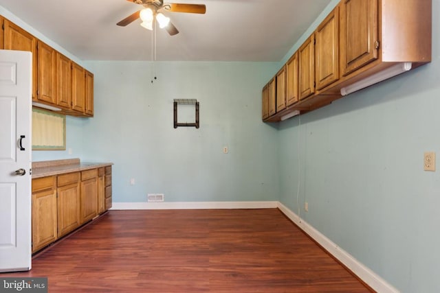 201 Happy Creek Rd, Locust Grove, VA 22508 - kitchen with ceiling fan, dark wood-type flooring, baseboards, and brown cabinets