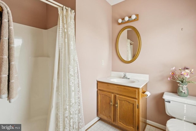 9839 Dominion Forest Cir, Fredericksburg, VA 22408 - bathroom with toilet, vanity, a shower with shower curtain, and baseboards