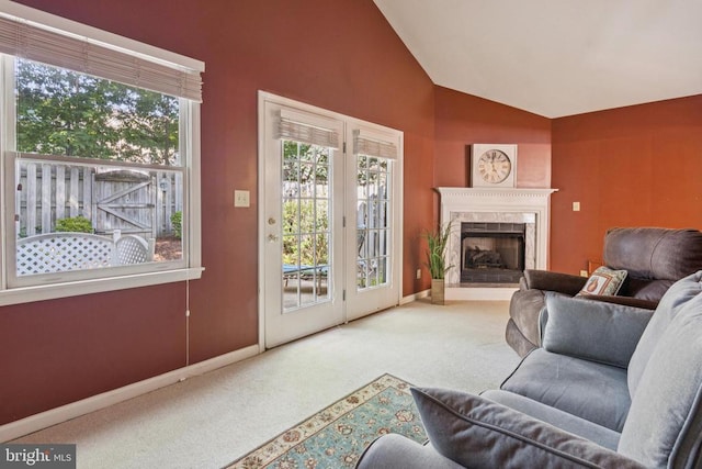 9839 Dominion Forest Cir, Fredericksburg, VA 22408 - carpeted living area with lofted ceiling, a high end fireplace, and baseboards