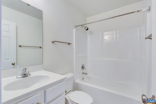 full bathroom featuring toilet, tub / shower combination, and vanity