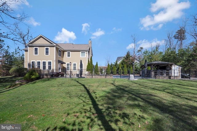 11001 Waterstone Pl, Spotsylvania, VA 22551 - rear view of property with a gazebo and a chimney